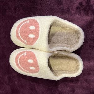 Pink and white smiley slippers
